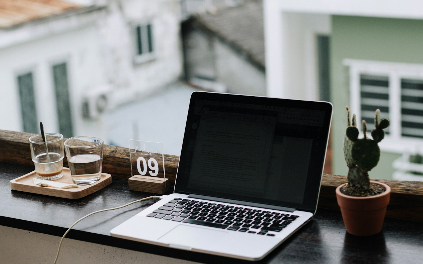 macbook pro on white table