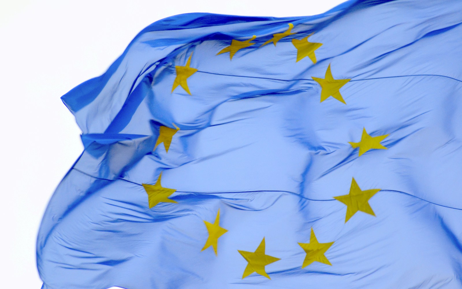 blue and yellow stars forming circle flag