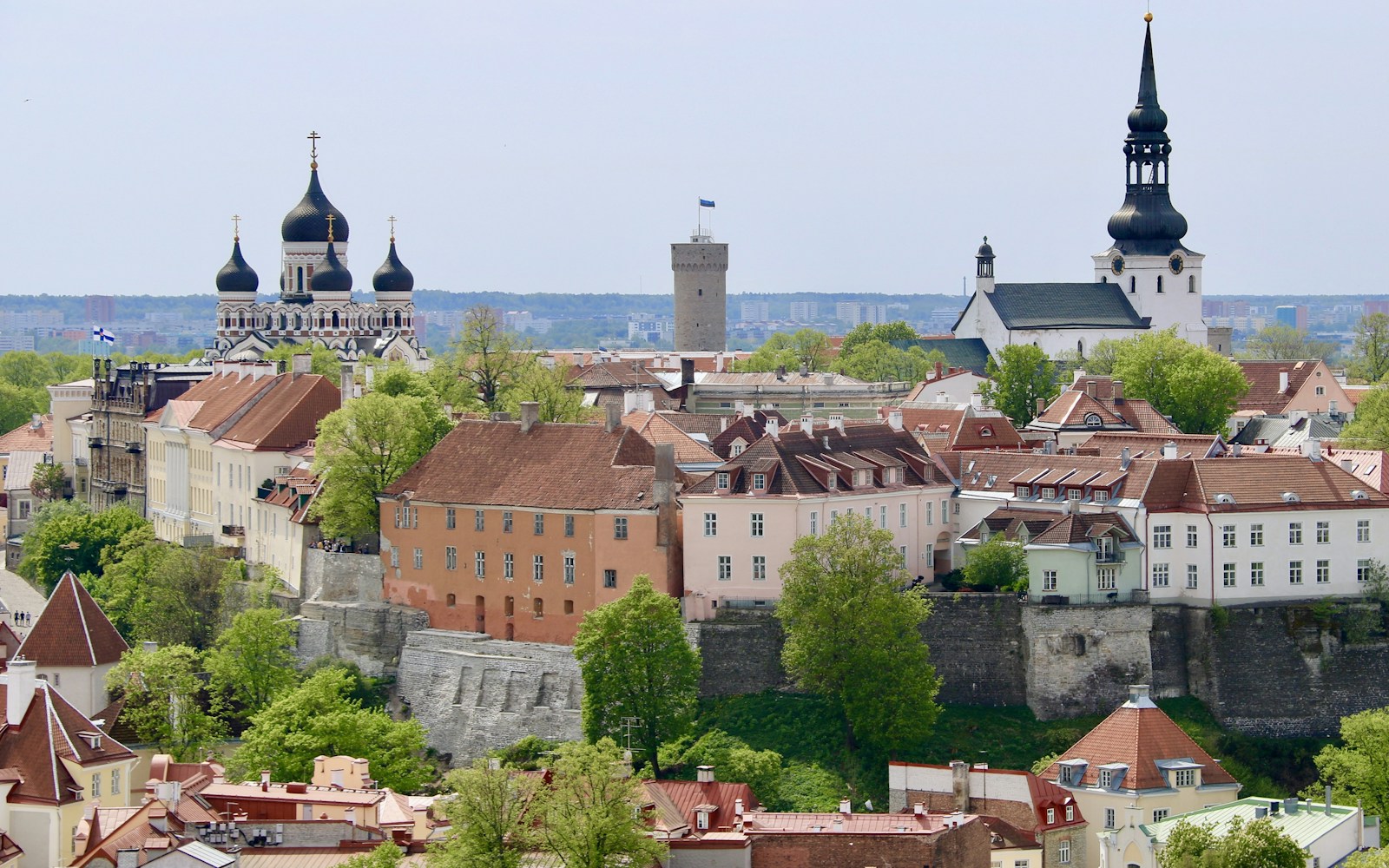 a view of a city from a hill
