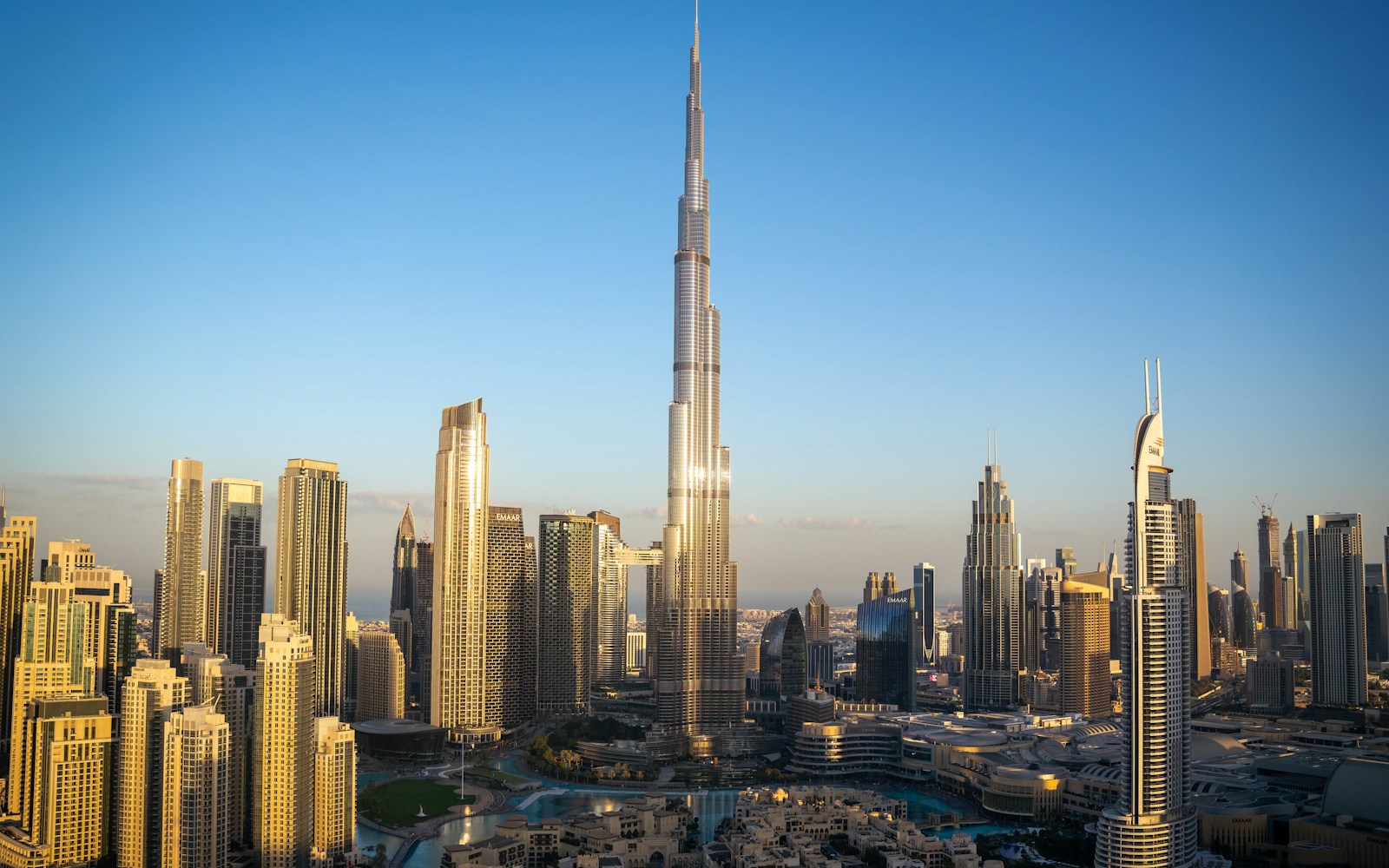An aerial view of a city with tall buildings